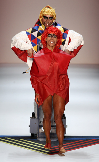 Illustration for article titled Scary Card-Playing Clowns, Lady Gaga Monsters, And Saran-Wrap Savages: Has Fashion Gone Insane?